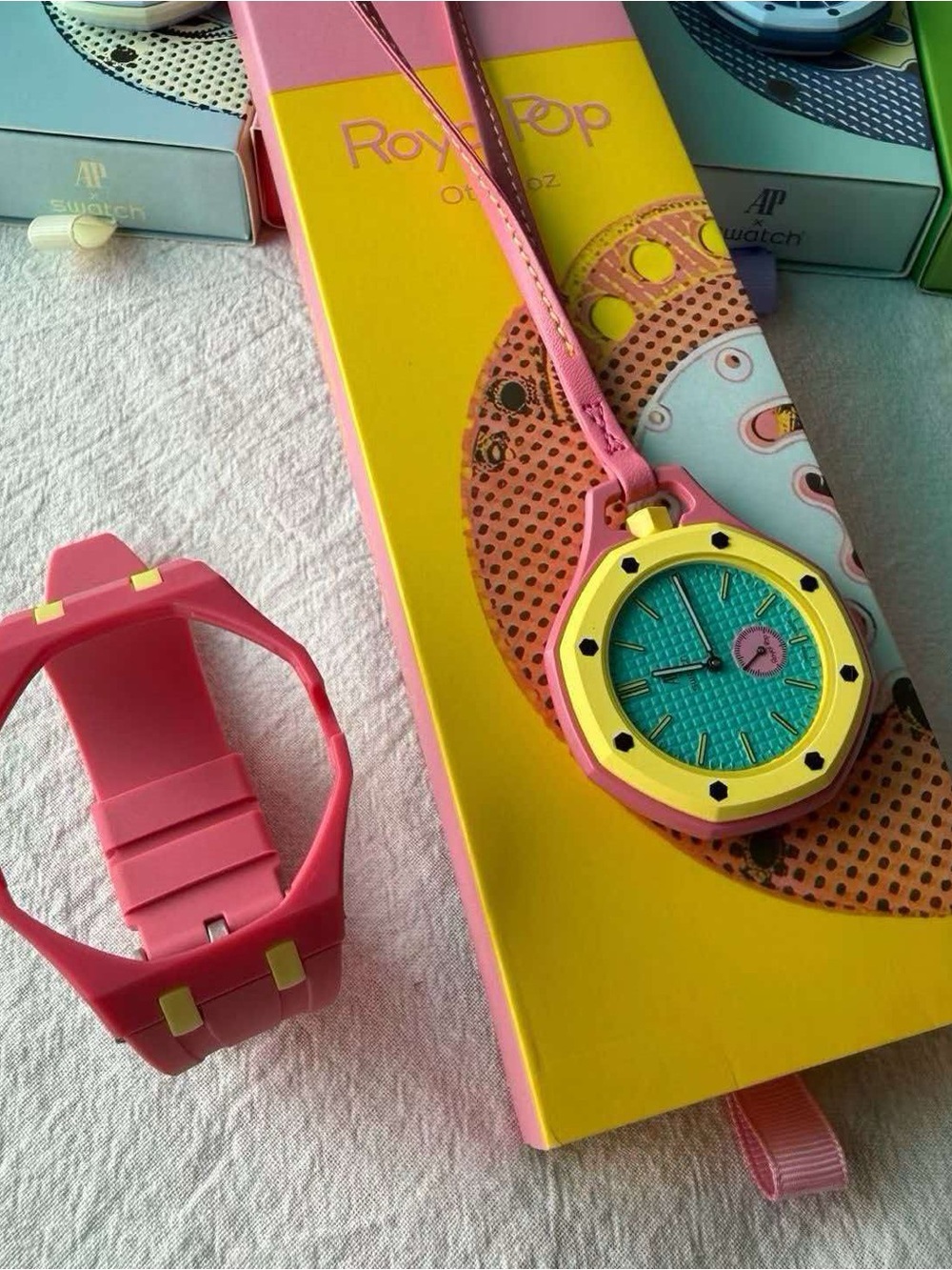 Pink & Yellow Pendant Watch with Teal Dial